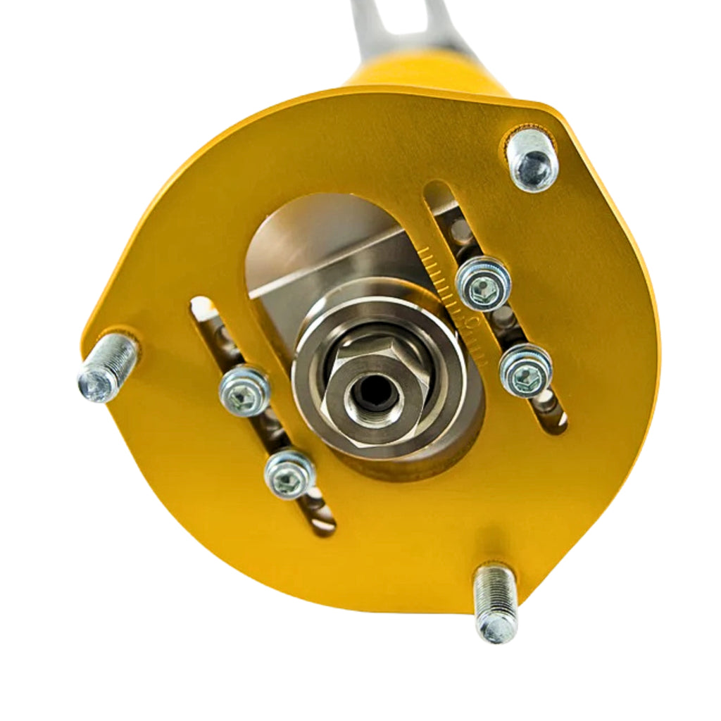 Close-up of a mechanical component with a yellow housing and metallic parts on a white background