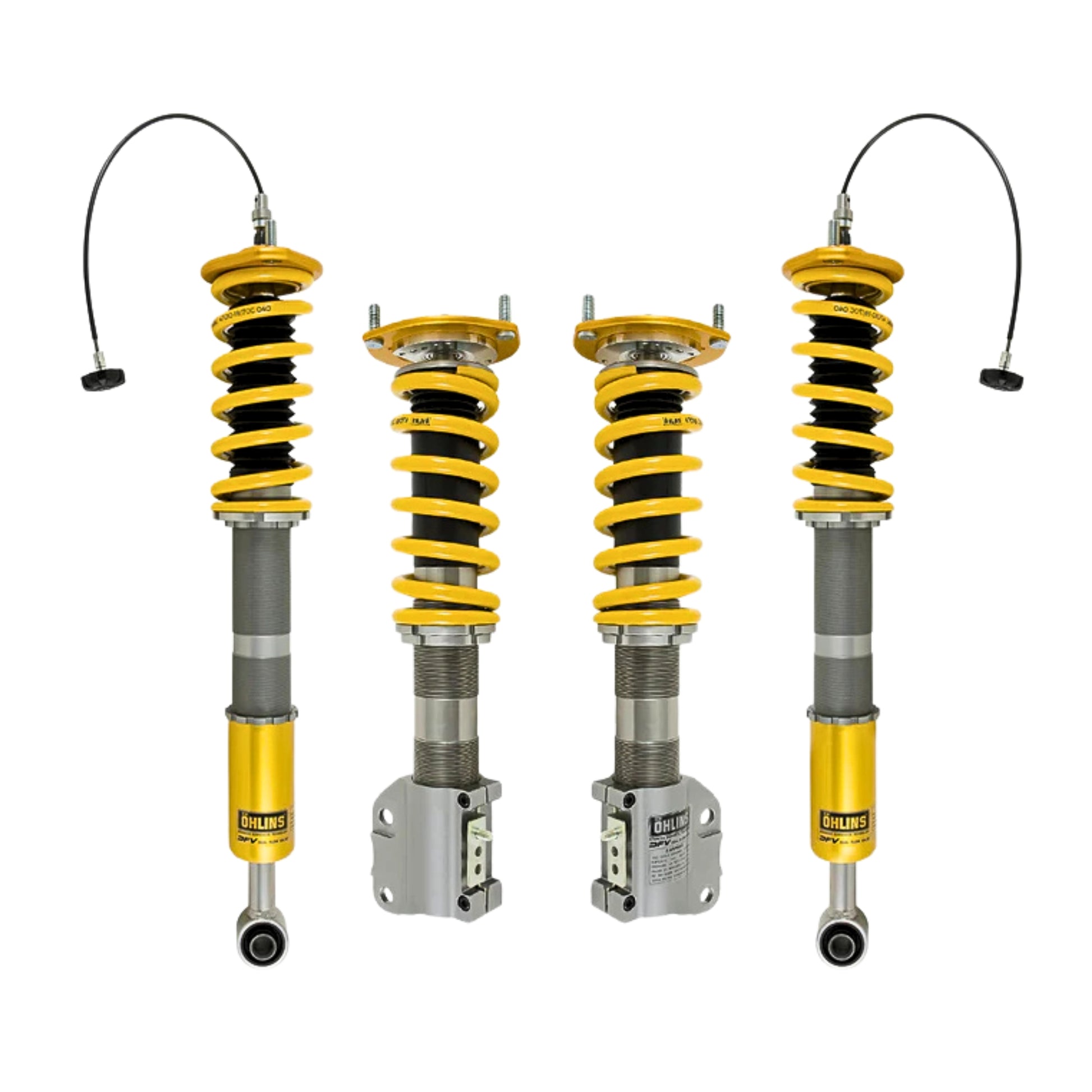Four Ohlins shock absorber coilovers with yellow springs on a white background